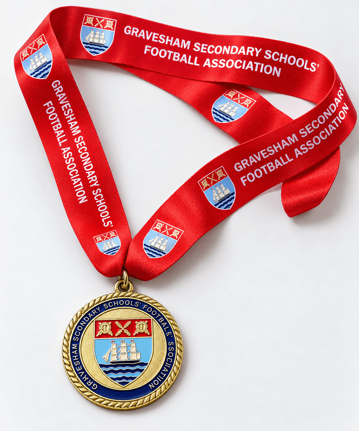 Gravesham Secondary Schools Football Association medal on a custom printed red ribbon
